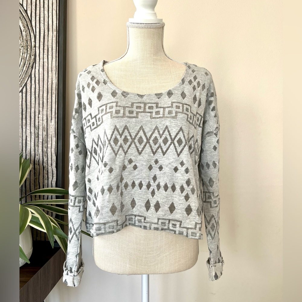 Halcyon Grey Long Sleeve Crop Top with a Tribal Print. Size Small